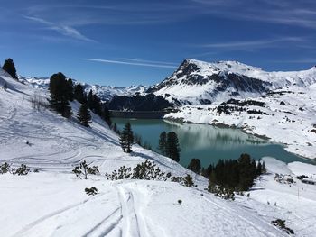 Snow covered mountains against sky