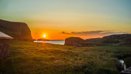 Scenic view of sunset over river