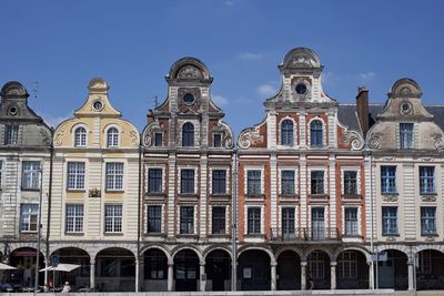 Low angle view of building against blue sky