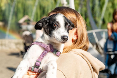Portrait of young woman with dog