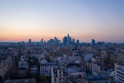 High angle view of buildings against sky during sunset