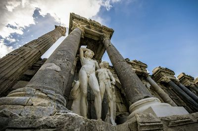 Low angle view of statue against sky