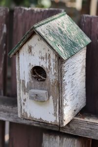 Close-up of old rustic bird house