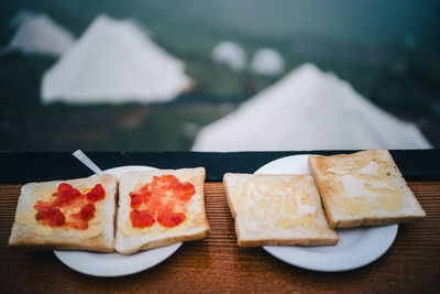 Close-up of breakfast served on table