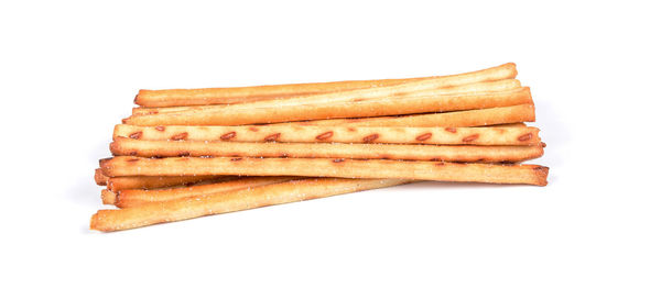 Close-up of bread against white background