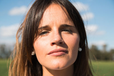 Close-up portrait of a smiling young woman