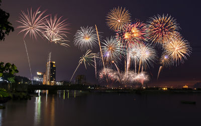 Firework display at night