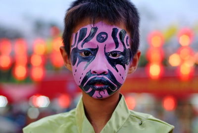 Close-up of boy wearing carnival costume