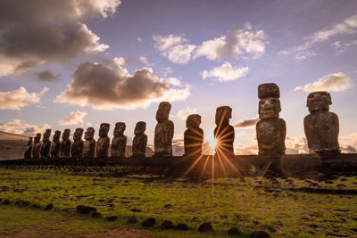 View of statues at sunset