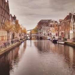 View of canal with buildings in background