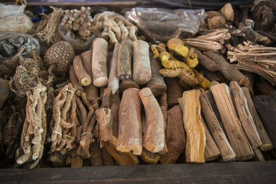 High angle view of various herbal medicines for sale at market