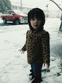 Girl with snow in car