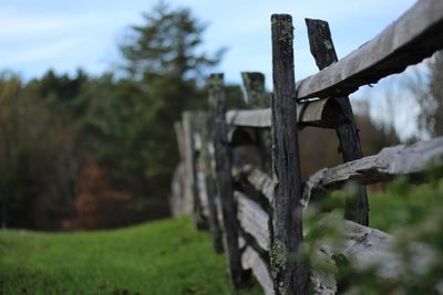 Wooden fence on field