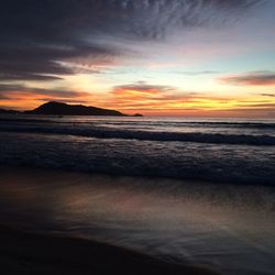 Scenic view of sea at sunset