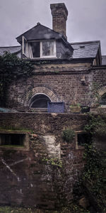 Low angle view of old building against sky