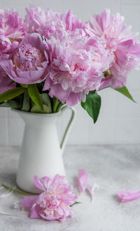 Beautiful bouquet of flowers white and pink peonies in a vase