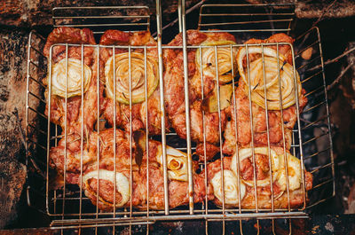 Close-up of meat on barbecue grill