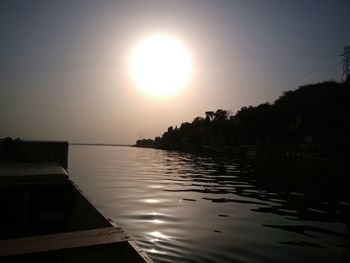 Scenic view of calm sea at sunset