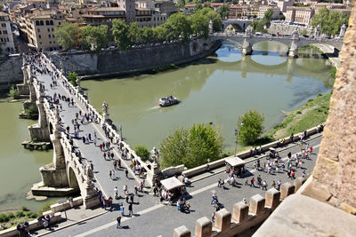 High angle view of people on boats in river