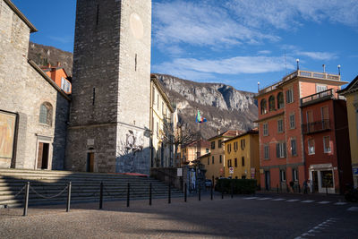 Buildings in city against sky