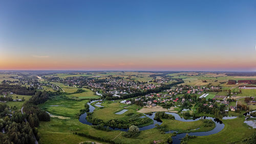 High angle view of townscape against sky during sunset