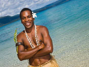 Portrait of man relaxing in sea