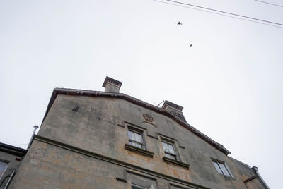 Low angle view of building against clear sky