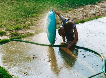 Reflection of woman in water