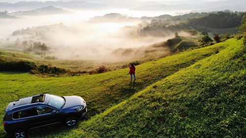 Scenic view of landscape during foggy weather