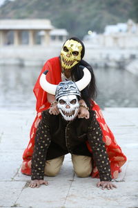 Portrait of young couple wearing mask