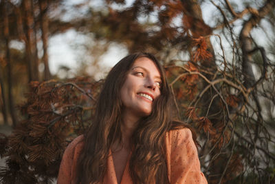 Portrait of smiling young woman