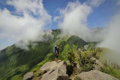 Tourists hiking on mountain