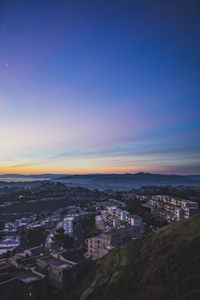 High angle view of townscape against sky at sunset