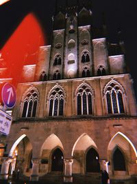 Low angle view of illuminated building at night