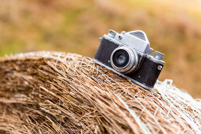 Close-up of camera on field