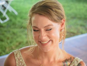 Close-up portrait of a smiling young woman