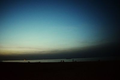 Silhouette of beach at sunset