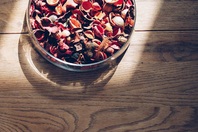 High angle view of nutshells in bowl on table