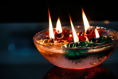 Close-up of burning candles