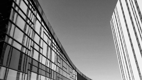 Low angle view of modern building against clear sky