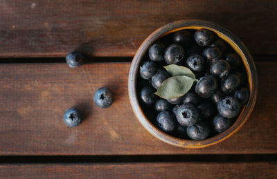 High angle view of fruits in bowl on table