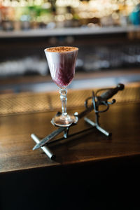 Close-up of wine glass on table