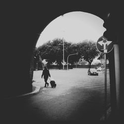 People walking in tunnel