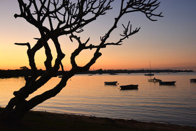 Scenic view of sunset over lake