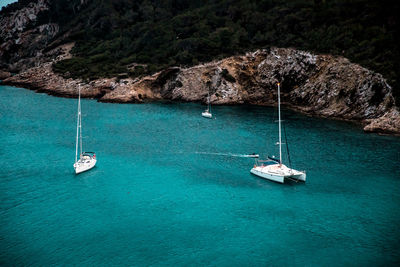 High angle view of sailboat sailing in sea