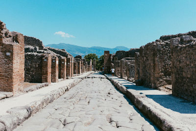 Panoramic view of historic building against clear blue sky