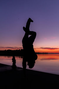 Silhouette of people at sunset