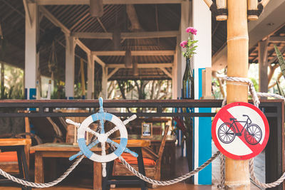 Wooden steering wheel in the beach restaurant. bali island. indonesia.