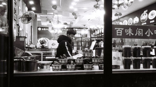 People standing in front of restaurant