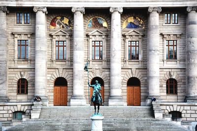 Woman walking on building